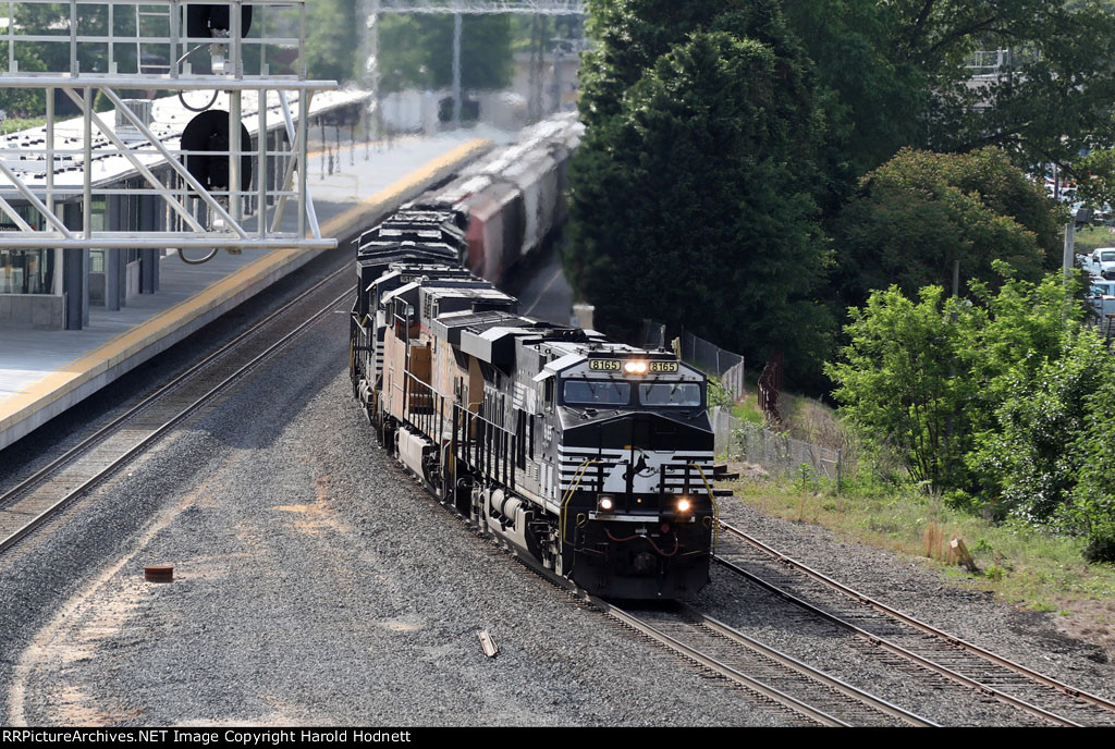NS 8165 leads train 60U past the new station